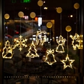 Set of 8 warm yellow LED Christmas suction cup window lights in festive various shapes - Set 11 - 8 Styles