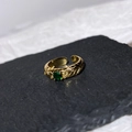 Adjustable gold ring with woven texture and green zircon stone on black stone plate - Gold Green Stone Woven Open Ring