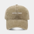 Detail of Chill Vibes embroidery on vintage washed cotton baseball cap in light khaki - Adjustable / Khaki