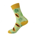 Mint green crew socks with yellow accents featuring tropical papaya and leaf patterns - Mint Green Papaya