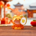 Cute orange capybara tiger figurine holding a white lucky sign on wooden desk - 3158 Qilin Figure