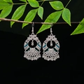 Close-up of ethnic silver alloy earrings with blue enamel detailing and bell tassels - Silver Cyan Blue Bell Tassel(E5333)