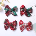 Gros plan de quatre nœuds de Noël avec motifs de flocons rouges et verts sur tissu de lin - 8.5*6.5 cm / Multicolore
