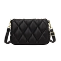 Black quilted crossbody bag with gold hardware and adjustable strap on white background - Black