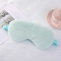 Soft light green plush sleeping eye mask with elastic strap on white fuzzy background - Fresh Green