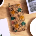 Bohemian floral cork wallet with colorful patterns and golden zipper on wooden table - Style C