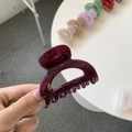 Close-up of a matte dark red shark hair claw clip with a thick butterfly square design - Cherry Red