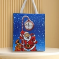 Detail of Christmas canvas tote bag featuring Santa Claus and clock print on blue fabric - Style 14