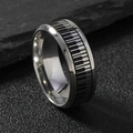 Modern stainless steel ring featuring a black and white piano key design on a stone surface - US 6 / Steel Color (Piano Key)