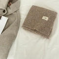 Soft wool blend oatmeal knit scarf with egg label and subtle ribbed texture detail - egg Series / Oatmeal