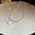 Double-layered necklace with silver beads and a central white pearl pendant on a chain - Two-way Wear Crushed Silver Pearl Necklace