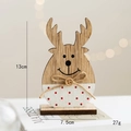 Statuetta di renna natalizia in legno con venature naturali e pois bianchi - Renna In Legno Naturale A Pois Rossi