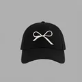Black cotton baseball cap with sweet cream bow embroidery and classic six-panel design - Hard Top Bow Baseball Cap Style / Black