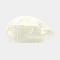 Detailed macro view of the cream knitted beret showing the textured waffle weave pattern - One Size / White