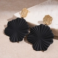 Detail view of black matte floral drop earrings with gold hammered metal and pleated texture - Pleated Fan Style / Gold
