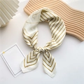 Elegant silk scarf in cream white with golden green stripes and HEARFELT lettering - Geometric Line Yellow