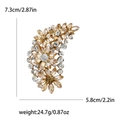 Vintage golden floral brooch with champagne crystals and size dimensions shown on white background - Champagne
