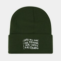 Detailed close-up of dark green ribbed knit beanie featuring white embroidered text - Army Green