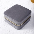 Compact dark grey velvet jewelry box with gold zipper for travel organization - Gray