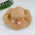 Detail of straw sun hat featuring layered bow and delicate lace scalloped edges - M (56-58cm) with Wind Rope / Light Coffee