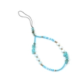 Detail of handmade beaded phone strap with turquoise stones and acrylic beads on white background - Turquoise Stone Style
