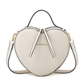 Detail of white heart-shaped handbag featuring textured faux leather and golden logo - 20*8*18 / White