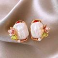 Detail view of pearl bouquet earrings with pink flowers on champagne silk fabric - Vintage Gold Pink Flower Baroque Pearl (9#)