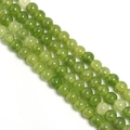 Macro detail of round light green glass beads with natural ice crack texture for DIY jewelry - 10mm/Approx 38pcs / Olive Green Floral Round Bead