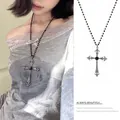 Macro detail of gothic black beaded necklace with ornate silver cross and grey bow - Gothic Cross Black Beaded Style (13#)
