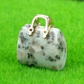 Mini handbag pendant made of natural dalmatian jasper stone with gold metal handle - Tianshan Blue