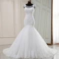 Abito da sposa a sirena bianco con ricami in pizzo, scollo trasparente e coda in tulle - US 2 / Bianco
