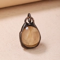 Vintage bronze teardrop pendant featuring a natural smoky quartz crystal stone - Smoky Quartz