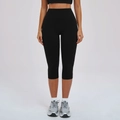 Zwarte high-waisted geborstelde yoga capri-leggings met slanke pasvorm en sportstof - S / Premium Zwart