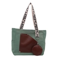 Green canvas tote backpack with brown leather pocket and geometric print strap - Green