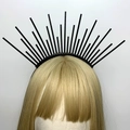 Detail of black halo crown headband with radiating sunburst spikes on blonde hair - Style 8