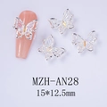 Macro shot of laser butterfly nail charms with iridescent crystal for manicure - Aurora Color Silver Frame Style (AN28)