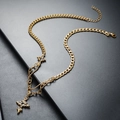 Close-up of gold titanium cuban chain necklace with a layered cross pendant and lobster clasp - Double Layer Cross Style (L331-B) / Gold