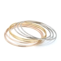 Set of multi-layered titanium steel round bangles in gold, silver, and rose gold finishes - Spiral Twill Three-Color Set (KB66649-LO)