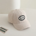 Detailed view of beige faux shearling baseball cap with vintage classic style patch - 54-56cm (approx. 4-10 years) / Off White