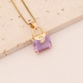 Golden necklace with a purple crystal handbag pendant featuring a moon-shaped zircon - Purple