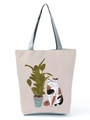 Detailed macro shot of the canvas fabric texture and cat illustration on the tote bag - Cat and Plant Illustration (hl3560)