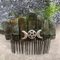 Macro detail of natural labradorite stones and moon symbol on handmade hair comb - Labradorite Black Wire Silver Moon