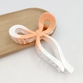 Elegant 13cm bow-shaped hair claw clip in vibrant orange and white gradient finish - Gradient Glossy Peach A