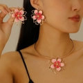 Golden flower jewelry set with pink enamel earrings and necklace worn by model - Pink Flower Jewelry Set (Earrings + Choker)
