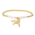 Elegante pulsera de cuentas doradas con perlas y un colgante de pájaro con diamantes - Estilo Pájaro