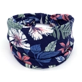 Navy blue elastic headband featuring white and pink hibiscus tropical floral patterns - 78