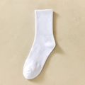 Single white mid-calf cotton sports sock with ribbed cuffs on a textured background - One Size / High Tube Sole Elastic White