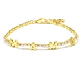 Detail of a gold-plated tennis bracelet with MAMA lettering and white zircon stones - MAMA Bracelet - Gold