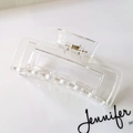 Detail view of transparent rectangular hair claw clip with golden metal spring mechanism - Transparent Glossy Style (S150-38) / 10.5cm