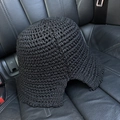 Detail of the black crochet hollow knit texture on a foldable women's sun bucket hat - M (56-58cm) / Black